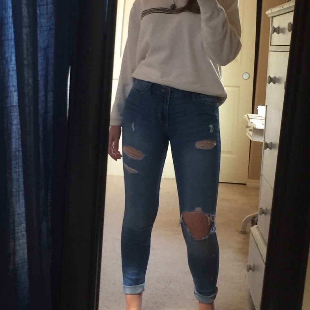 Light blue ripped jeans